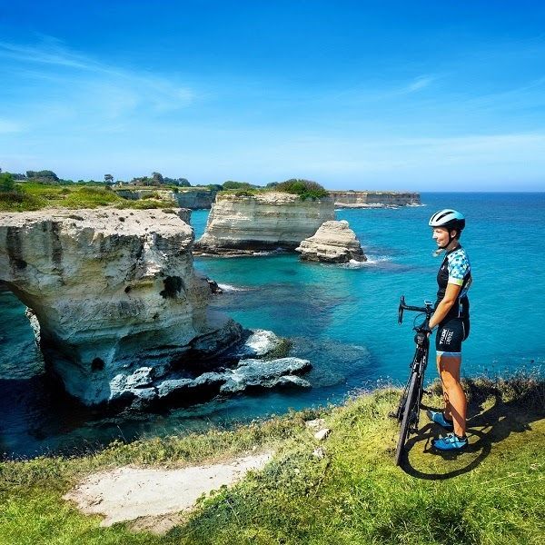 Person stands by sea in Puglia