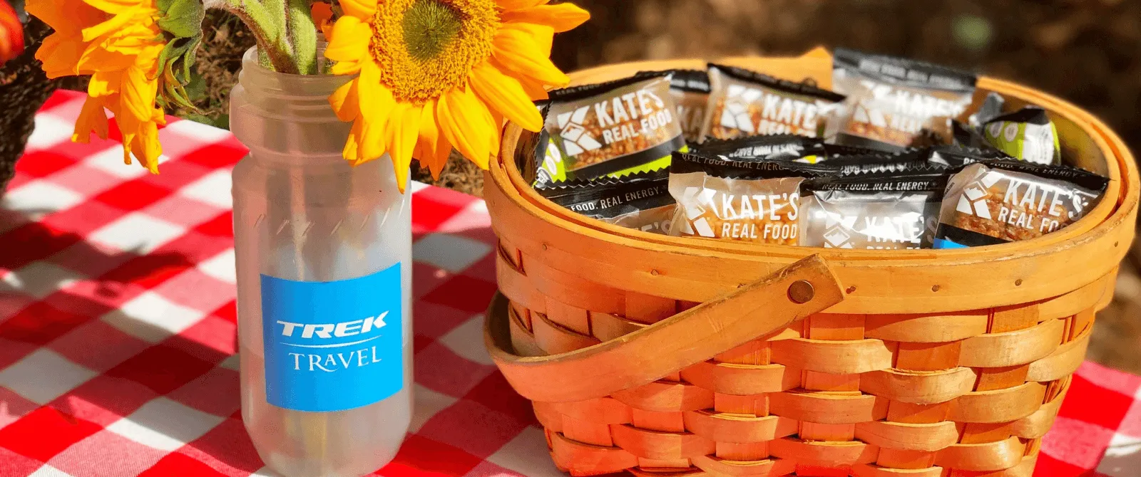 basket of food at a picnic table