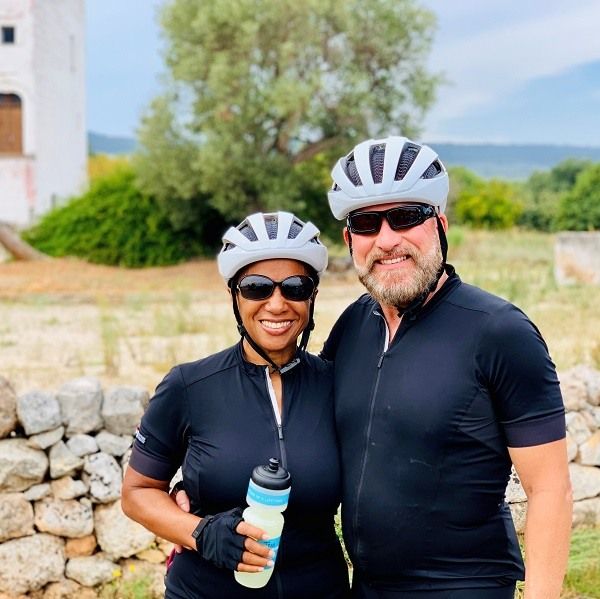 A couple poses for a photo in Puglia