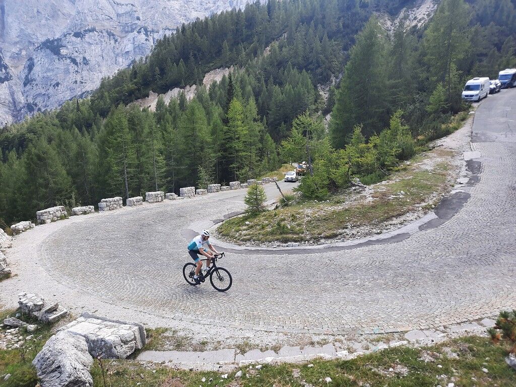 Biker climbing switchback