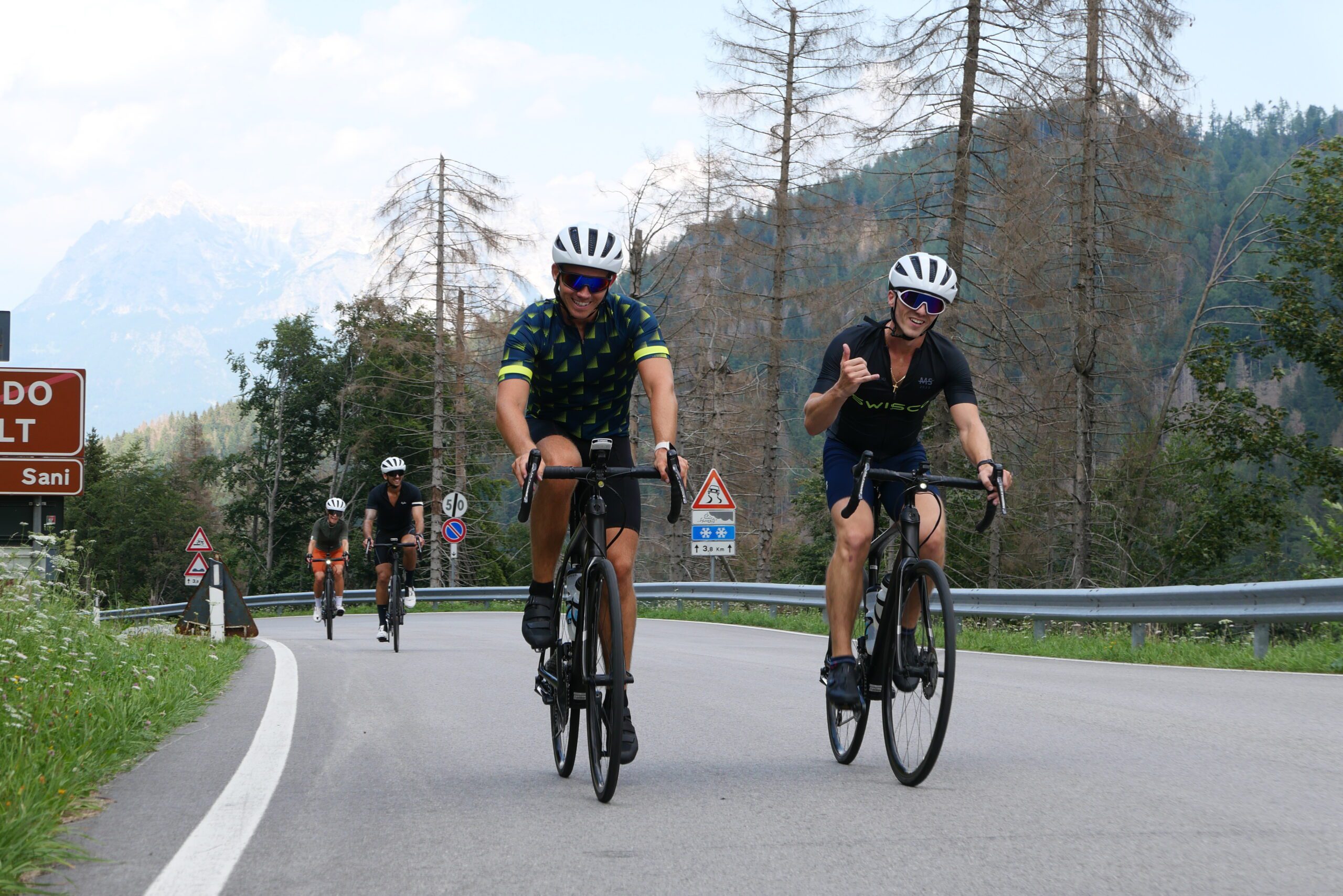 DL:people riding together in the Dolomites