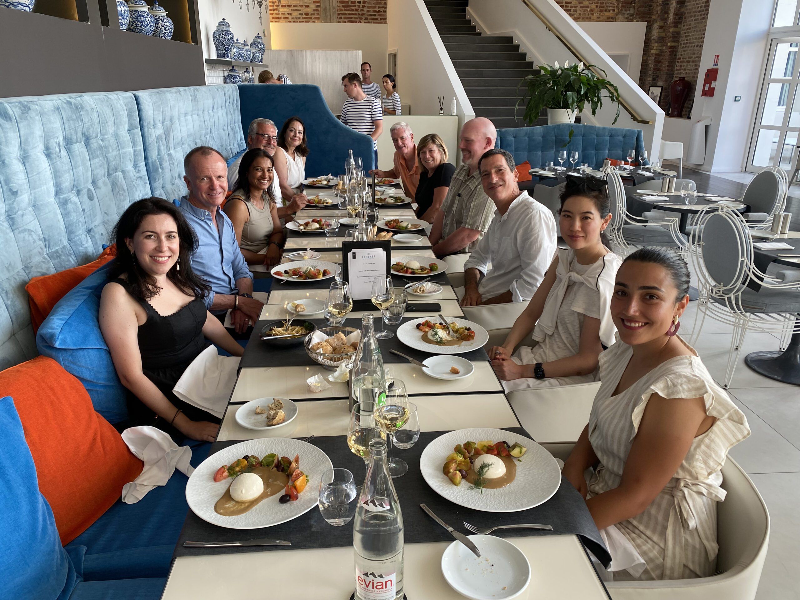 A group at the restaurant smiling at the camera