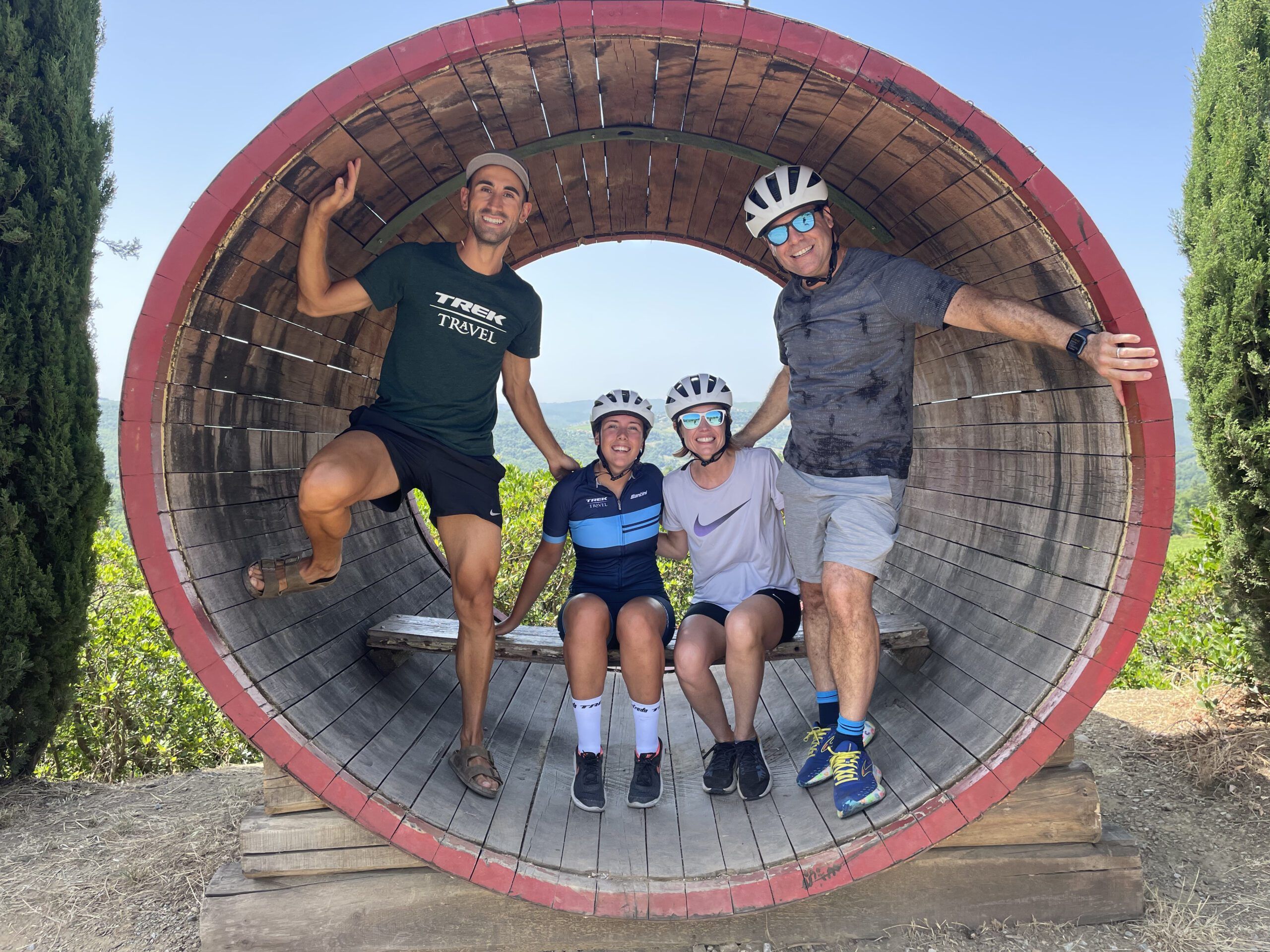 Group inside a huge wine barrel