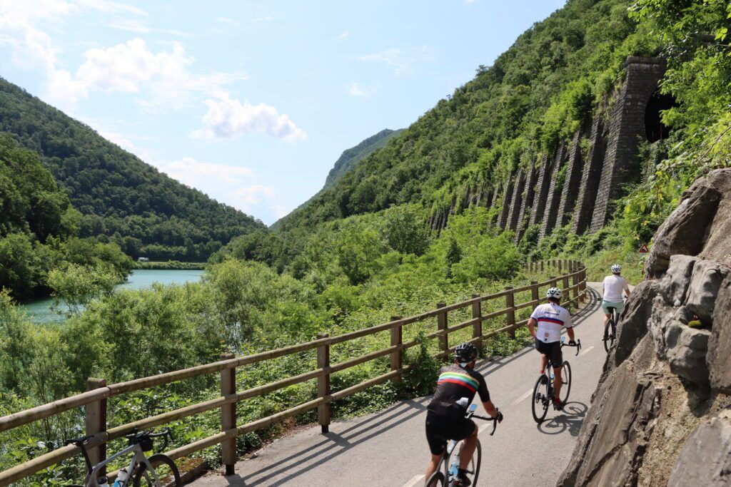 Cyclists on bike path along river