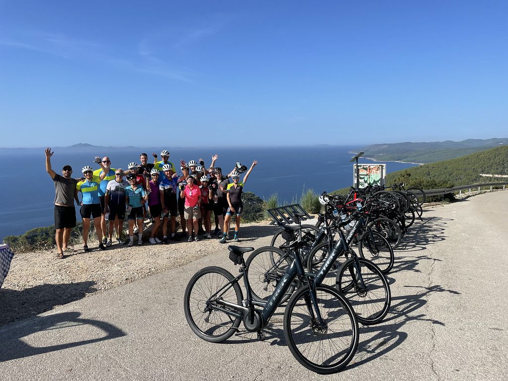 Bicycles, people, sea