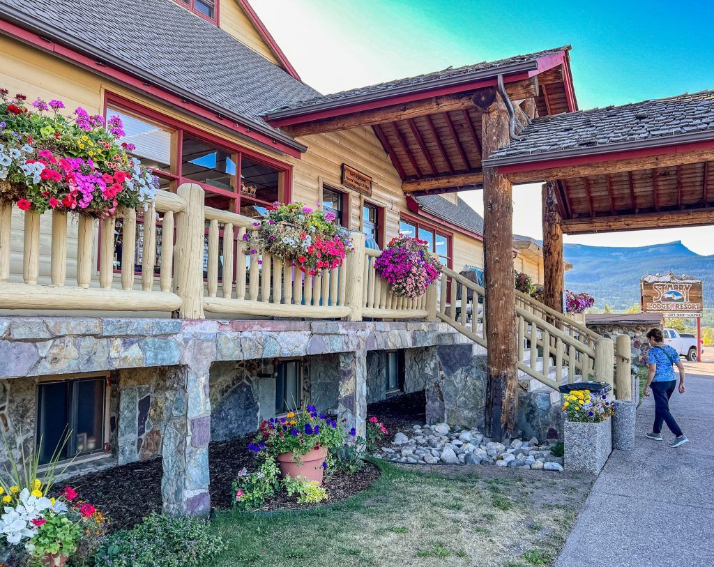 A person walking into St. Mary Lodge and Resort