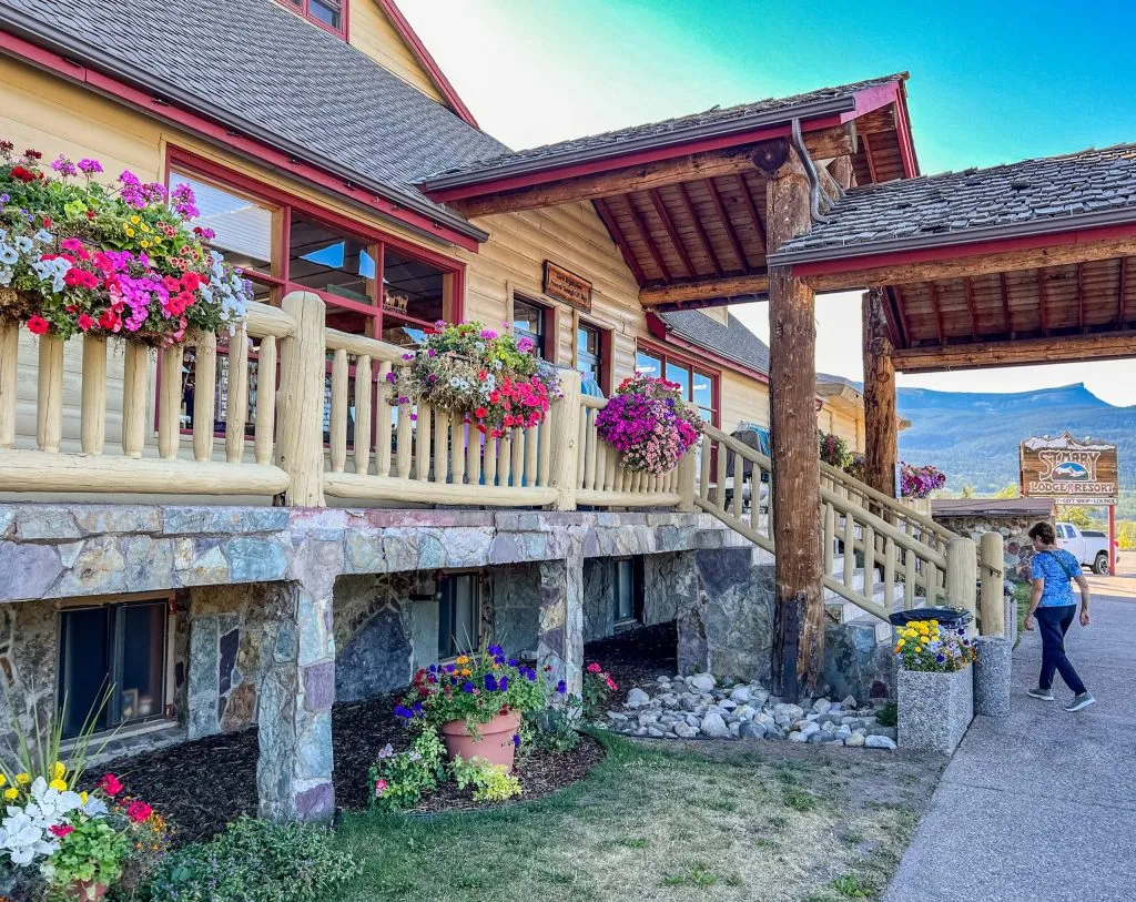 A person walking into St. Mary Lodge and Resort