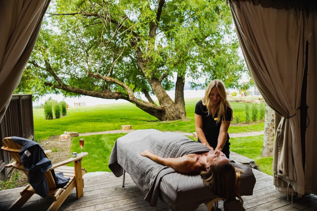 A person receives a massage at The Lodge at Whitefish Lake