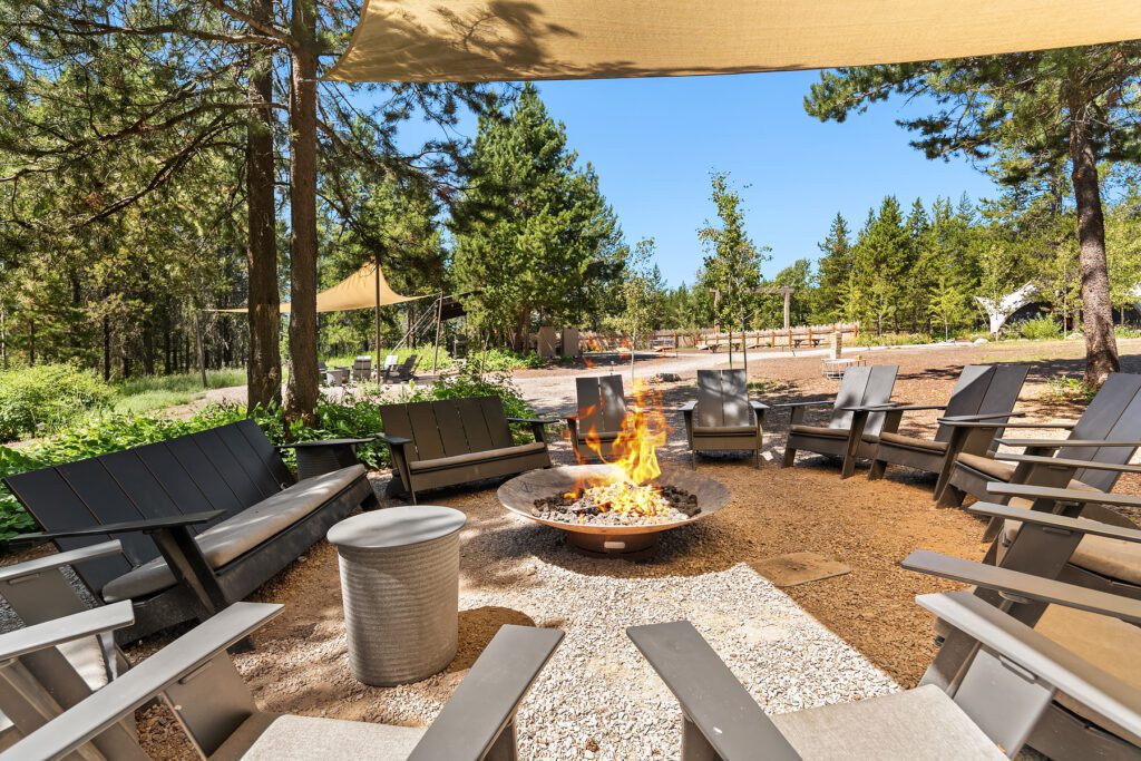 Firepit with chairs surrounding at Glacier Under Canvas