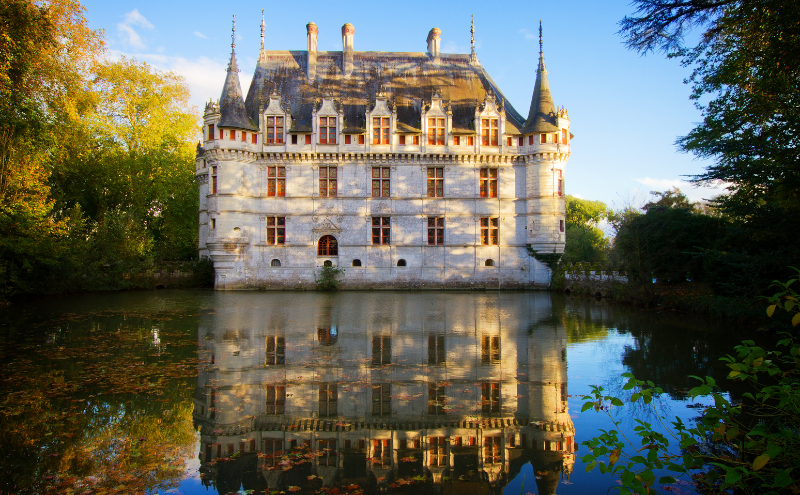 Chateau reflected in water