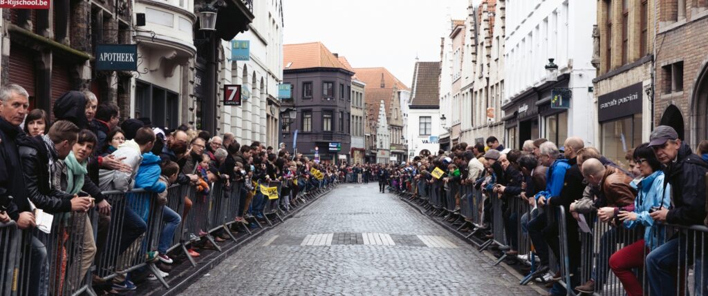 Crowd gathered in the street to watch bike race