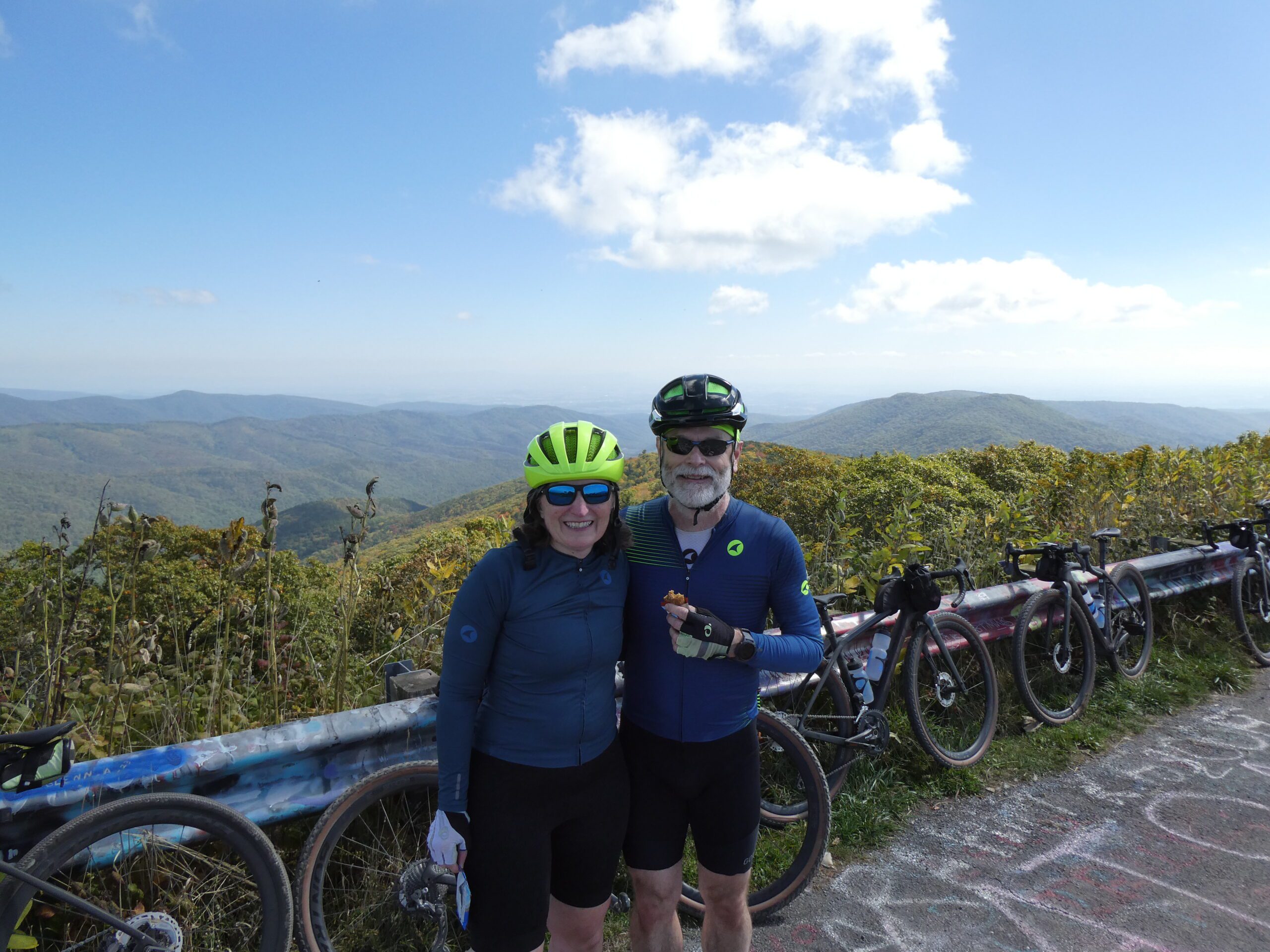 Cyclist couple with Blue Ridge Mountains in background
