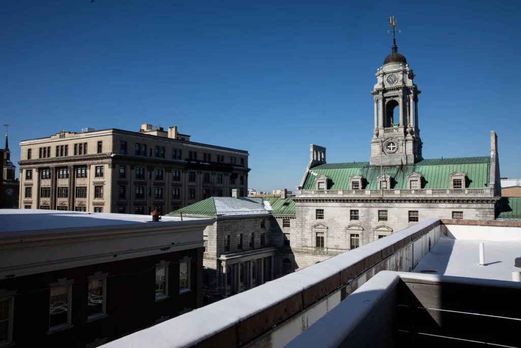 View from the rooftop of the hotel overlooking historic building with bell tower in Portland
