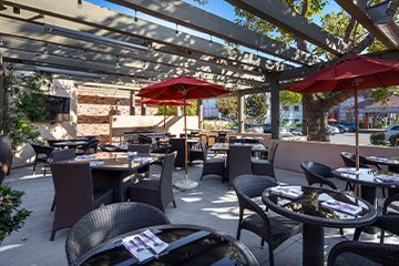 Outdoor dining patio at Corque Hotel