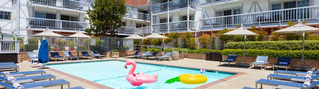 Pool area with surrounding rooms at Corque Hotel