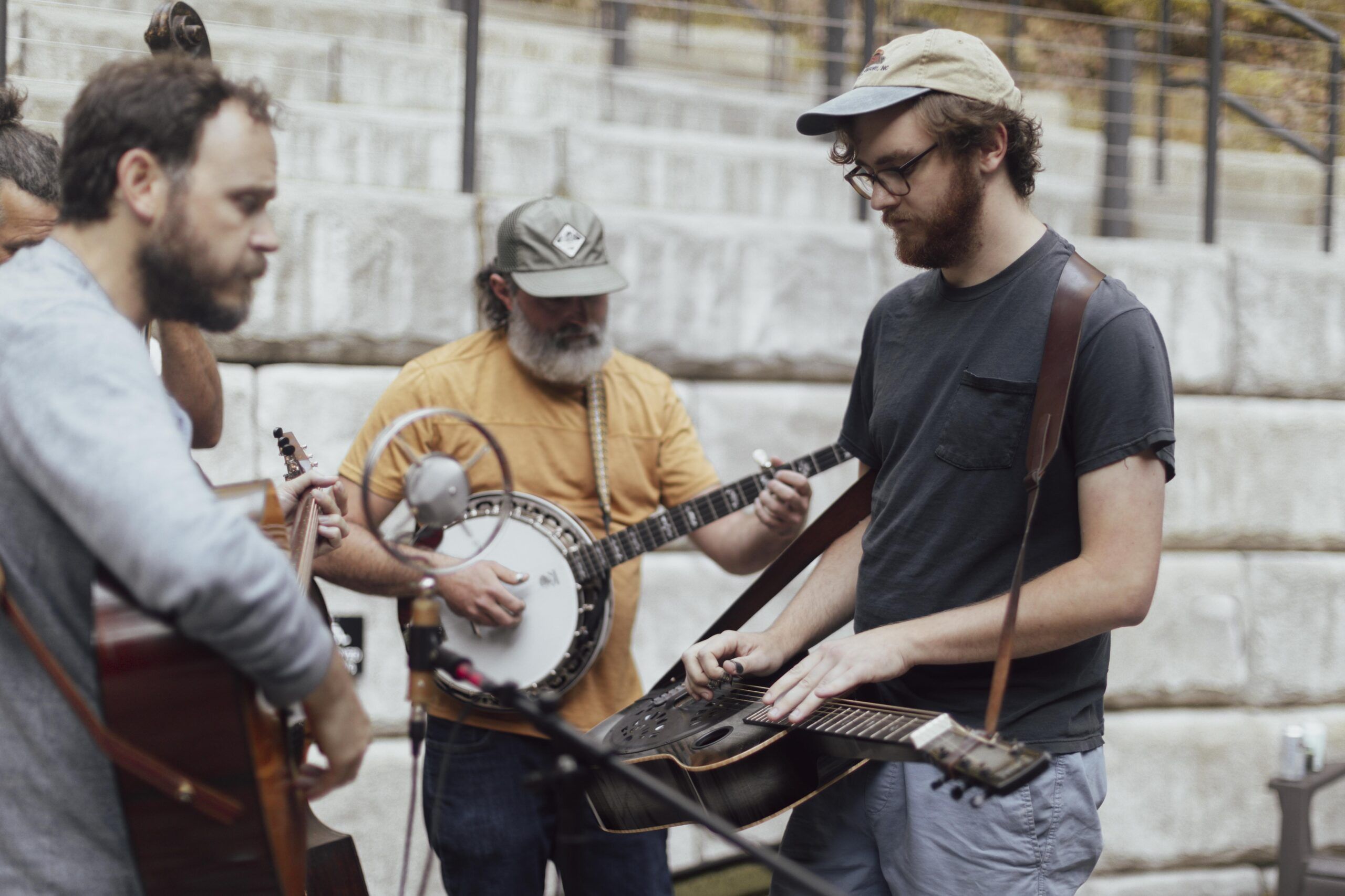 Four members of a bluegrass band play