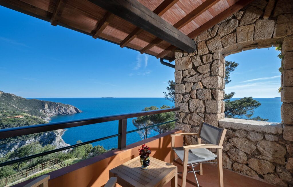 Balcony with tables overlooking mediterranean