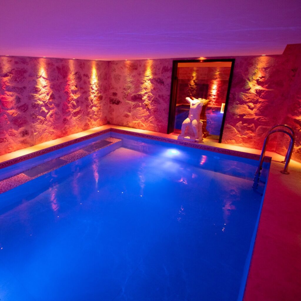 Spa pool with orange and blue lighting