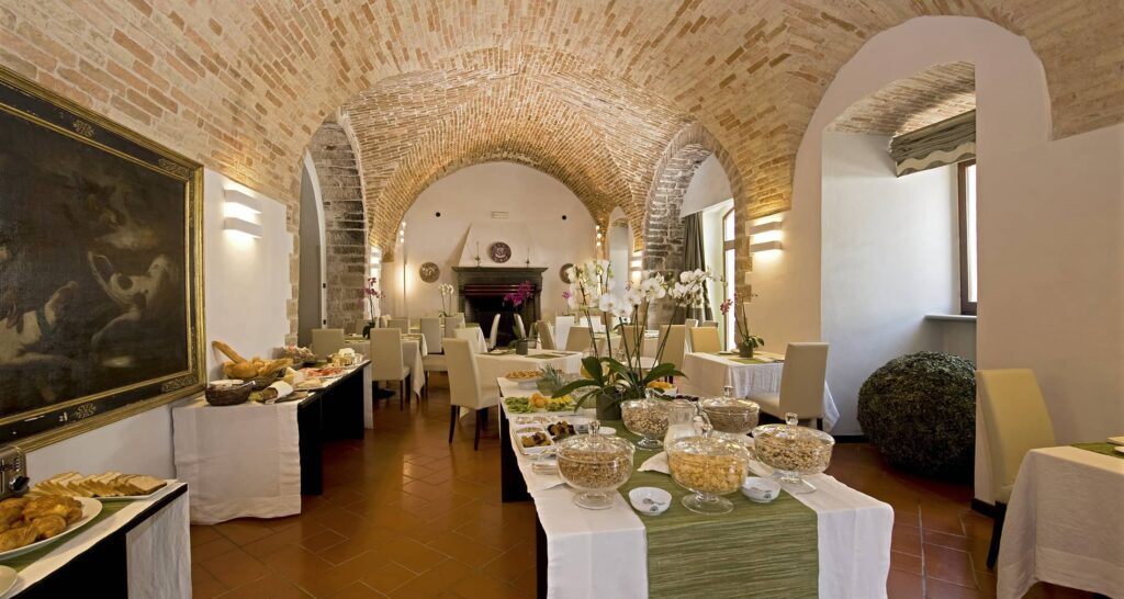 breakfast room made of stone walls and fine furnishings