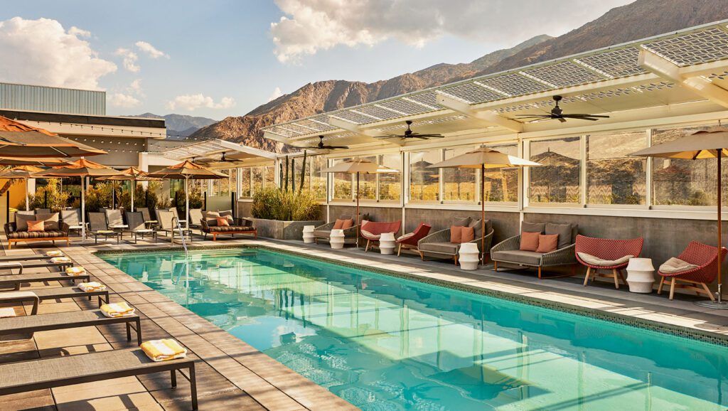 Rooftop terrace with pool and lounge charids