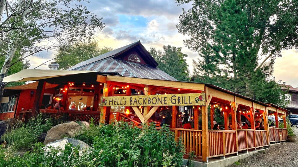 Hell's Backbone Grill restaurant with wooden outdoor patio