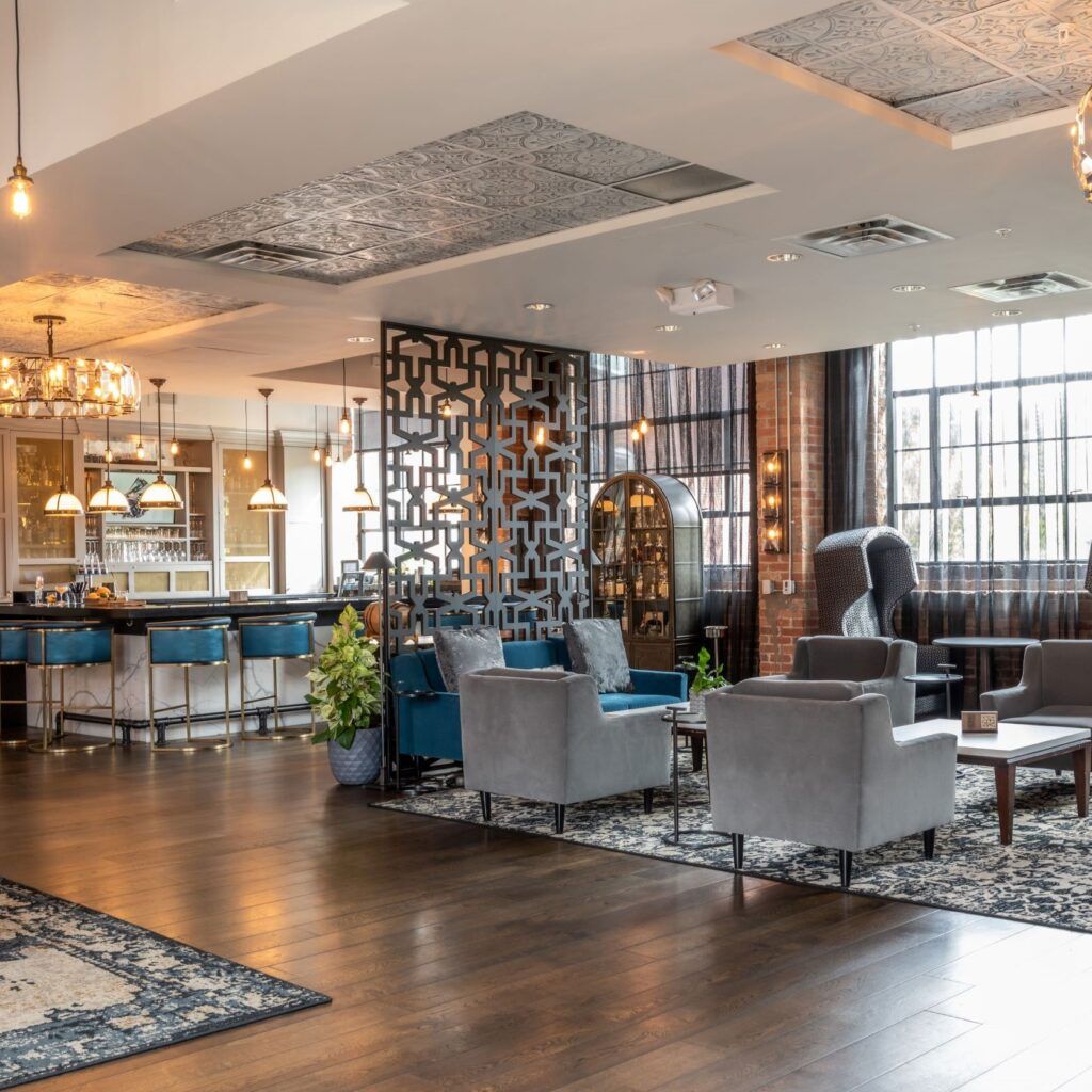 View of the bar and sitting area of The Workshop Lounge at The Foundry Hotel