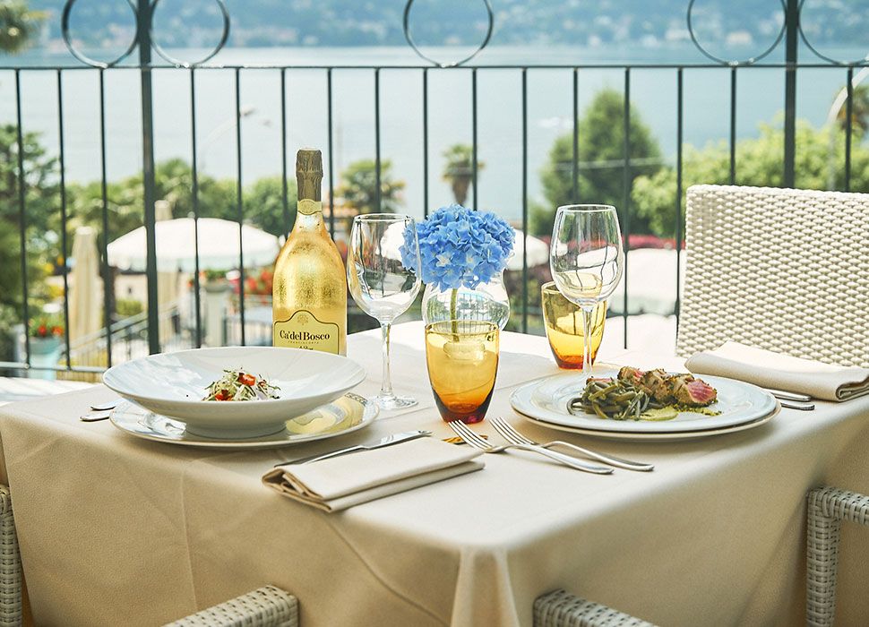 TABLE SET FOR MEAL BY THE LAKE