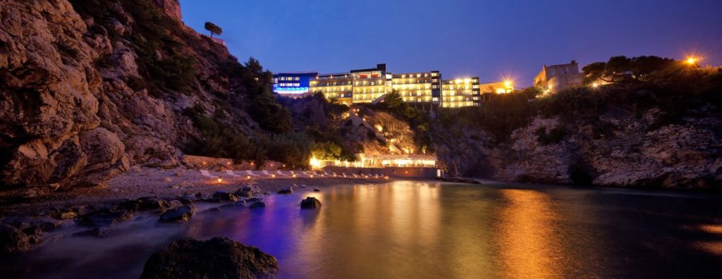 Sea by night with hotel
