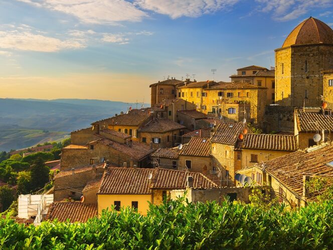 Hilltop town in Tuscany bathed in sunlight