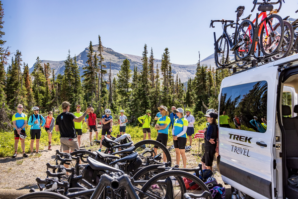 A group of people getting fit for bikes in Glacier National Park