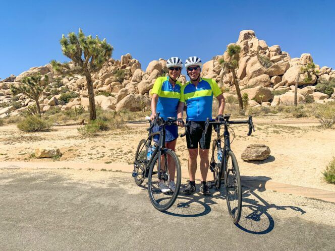 Two bikers standing by bikes in Palm Springs