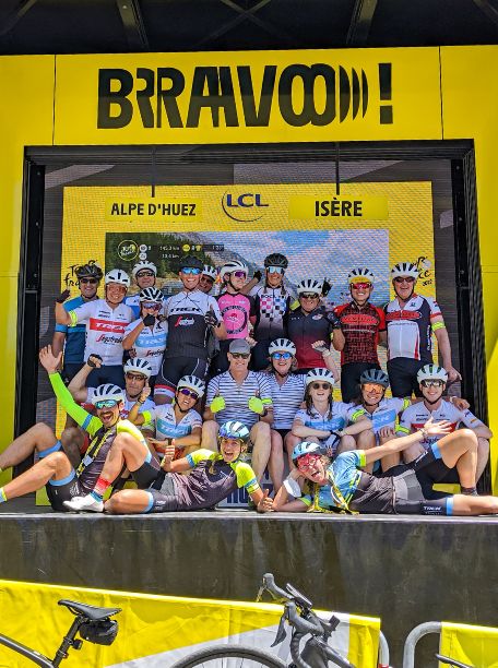 A group of people at a stage at the Tour de France