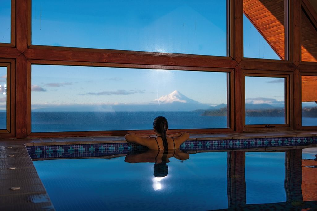 Pool with view of lake at Hotel Cumbres Puerto Varas