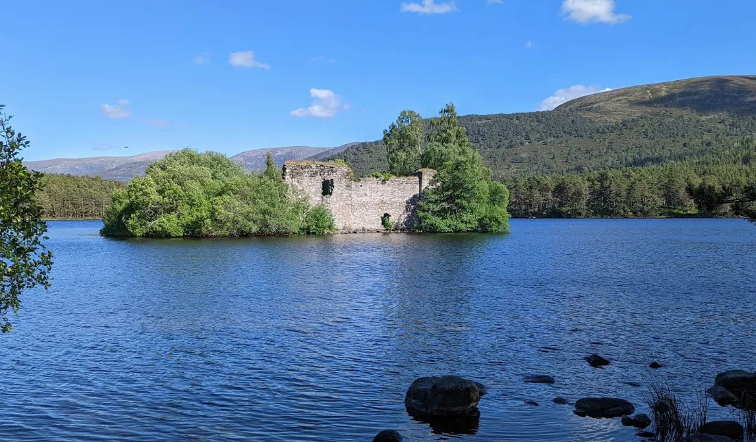 Wander the shore of Loch an Eilein