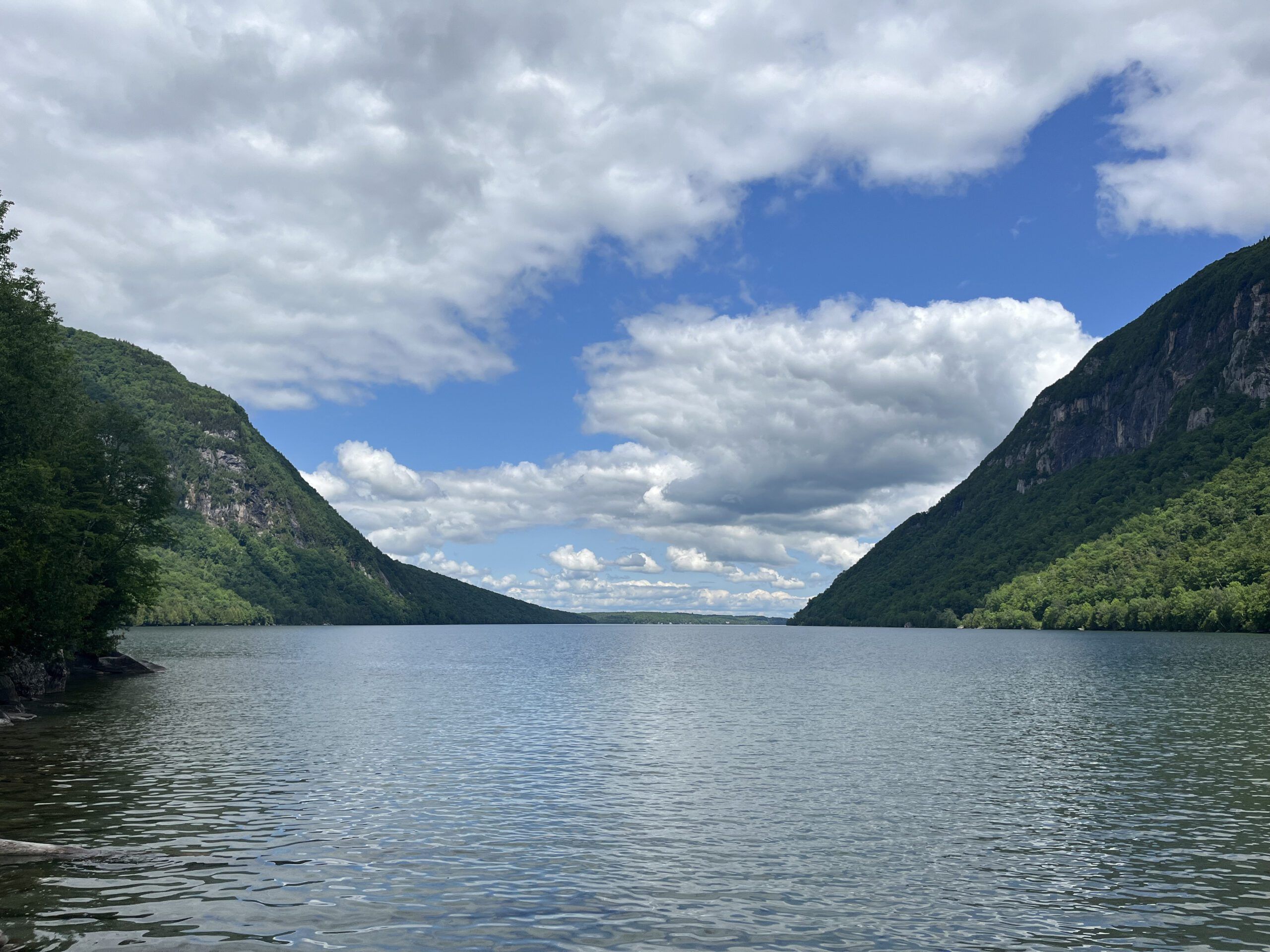 View of Lake Willoughby with steep rock walls on either side