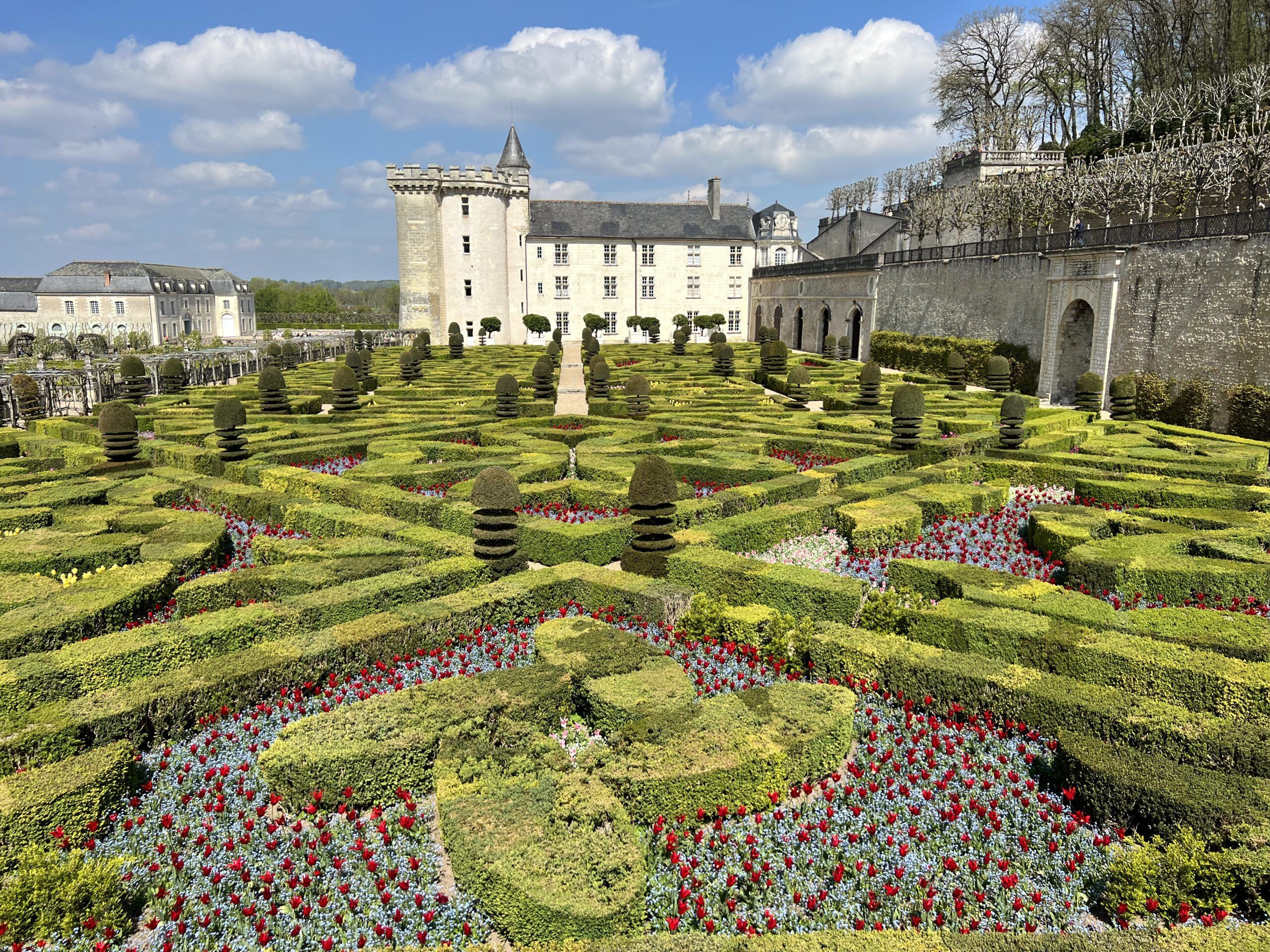 Castle with ornate gardens.