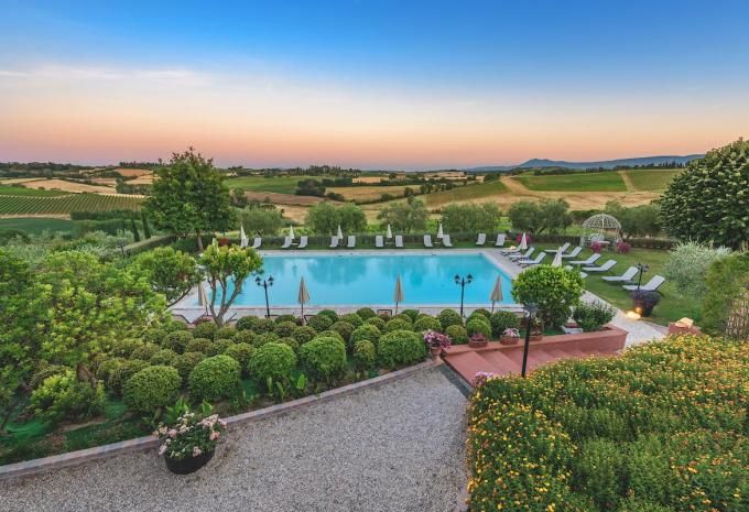 pool surrounded by stunning landscape