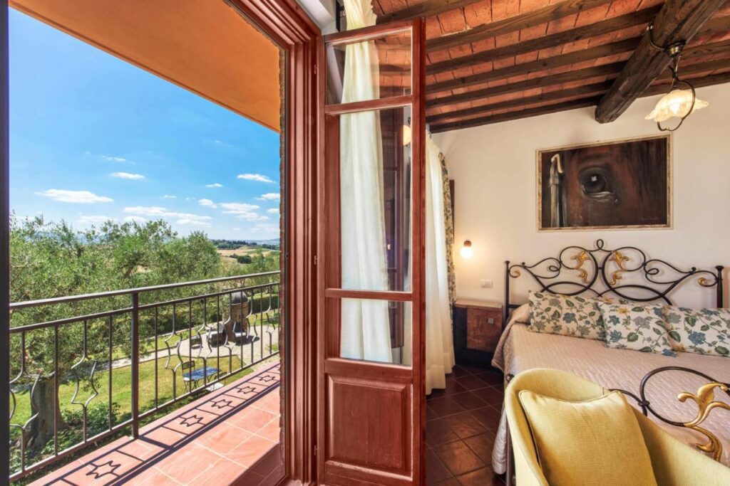 Hotel room and balcony at the Borgo Tre Rose
