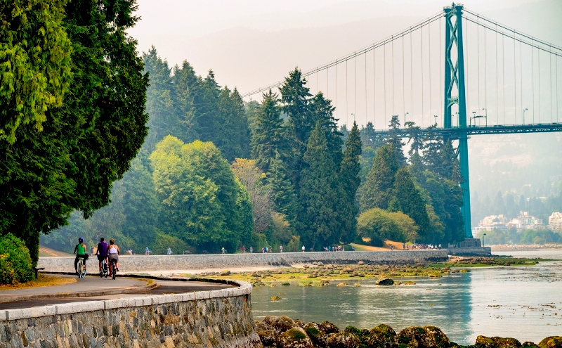 Stanley park bike path and view of bridge in Vancouver