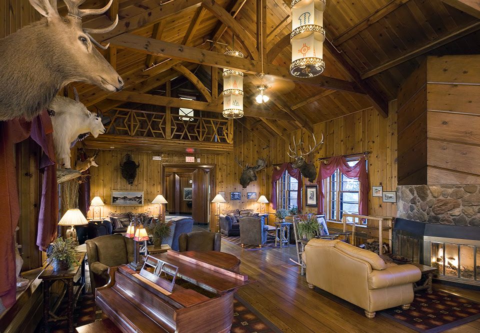 Hotel lobby with stuffed animal heads mounted on walls