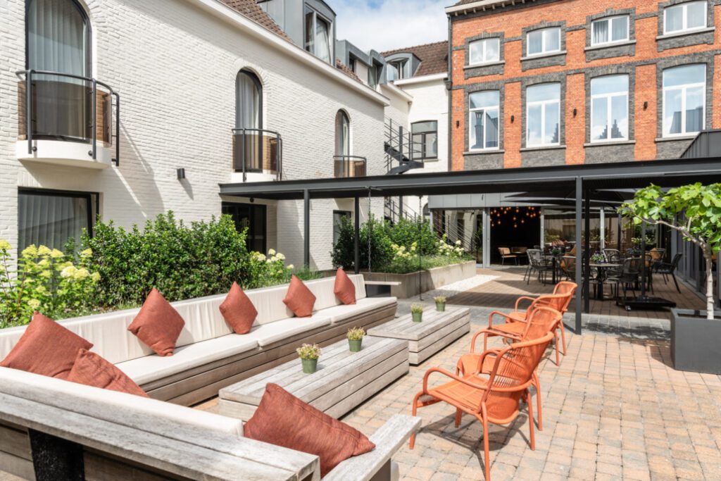 Back outdoor patio at Dukes' Academie hotel