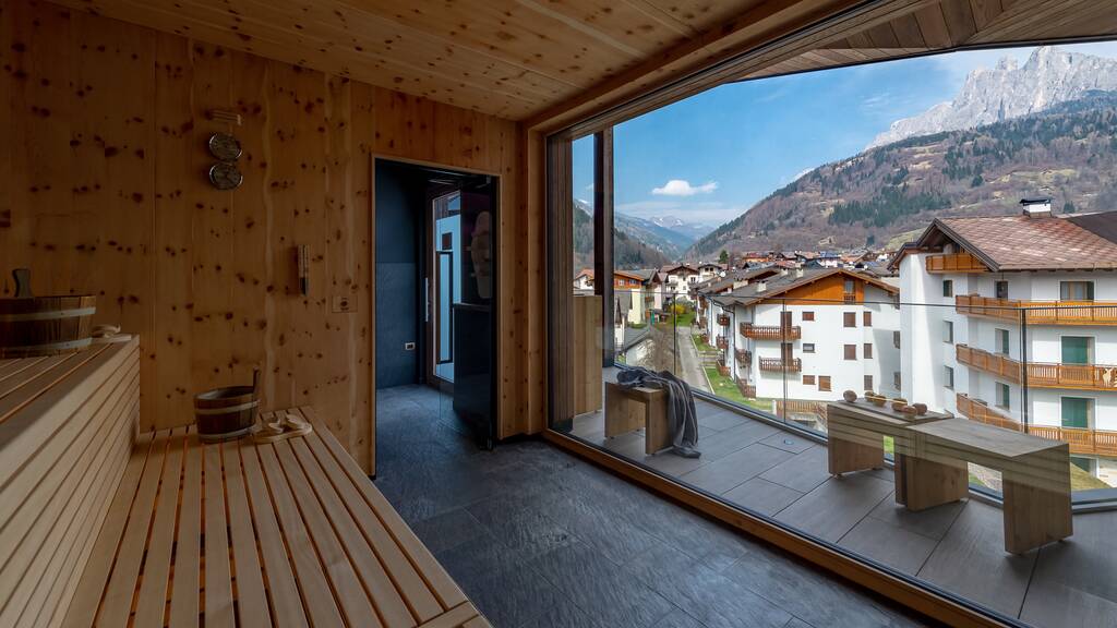 Hotel spa sauna with panoramic view of mountains