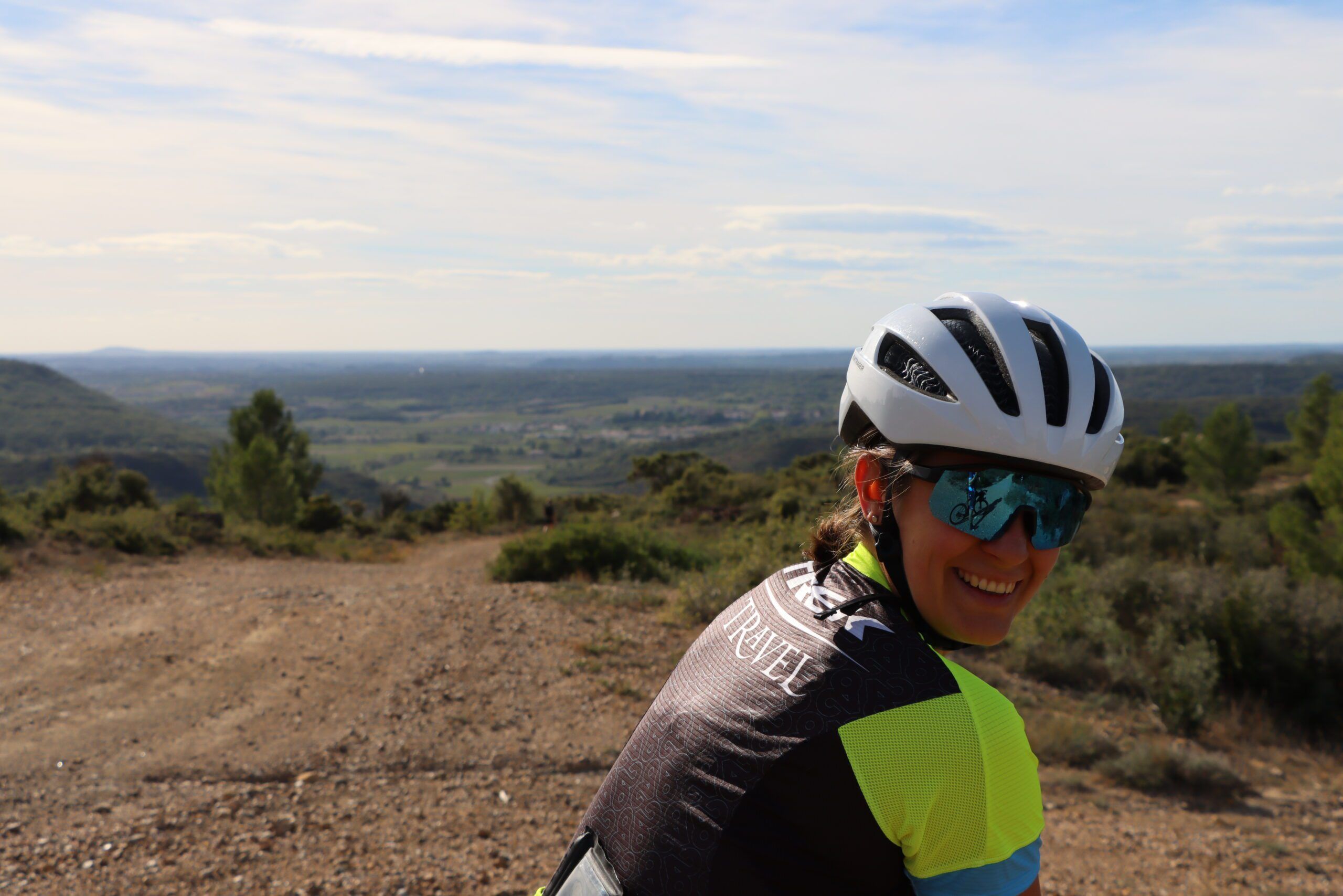 A cyclist with a helmet on