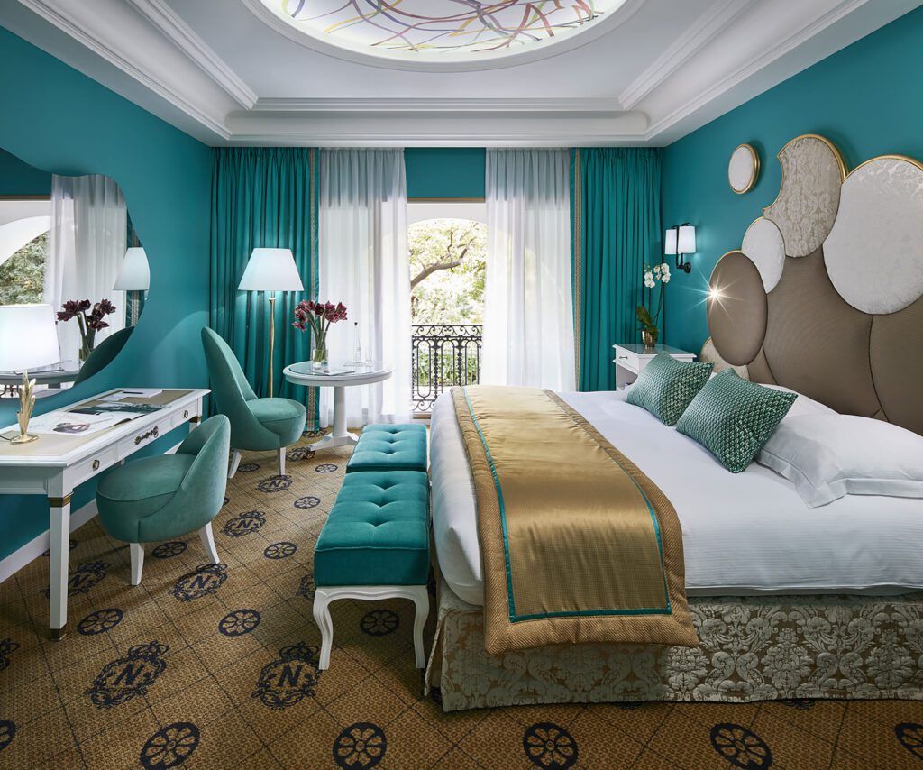 Ornate double hotel bedroom at Le Negresco