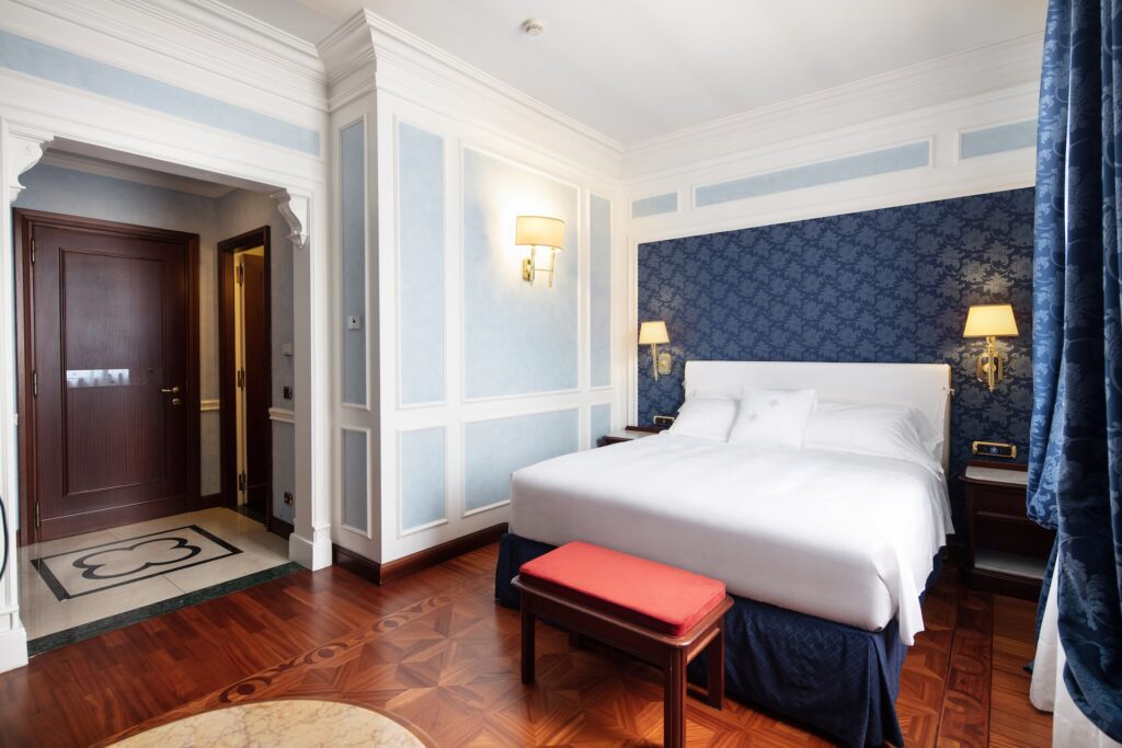 Double hotel room with decorative wooden flooring