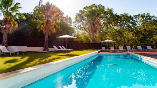 Pool and patio garden at Zenitude Relais & Spa