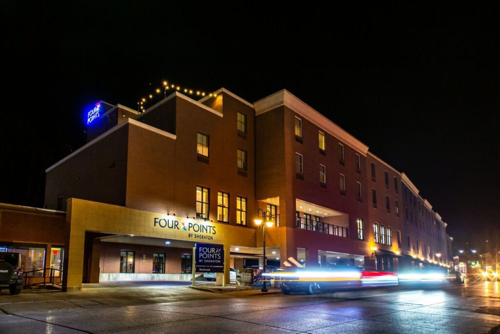 Exterior view of hotel at night.