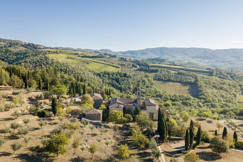 Aerial view of Pieve Aldina hotel and landscape