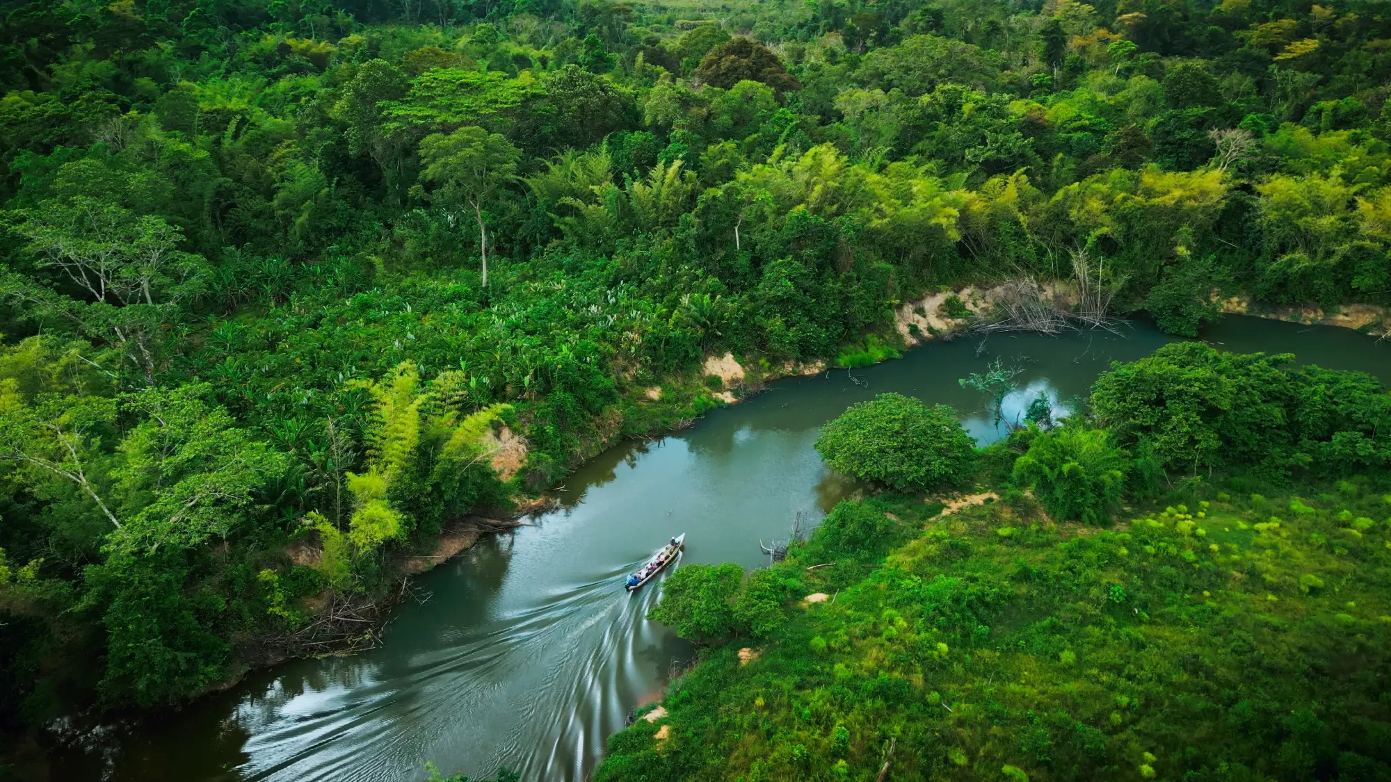 La Mosquitia Reforestation Project boat on the river.
